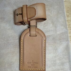 Louis Vuitton Luggage Tag & Poignant